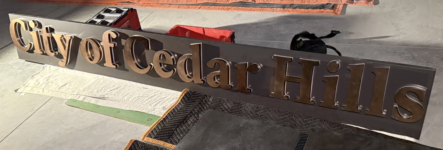 City of Cedar Hills channel-letter sign mounted on metal panel